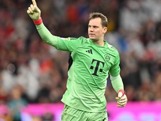 bayern munich director confirms ongoing contract negotiations with the club's full-back, highlighting the player's importance to the team's future plans.