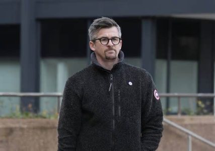 bayern director confirms ongoing contract negotiations with the club's full-back, highlighting the player's importance to the team.